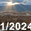 photo os sun rays striking through grey clouds in the late fall in Montana.