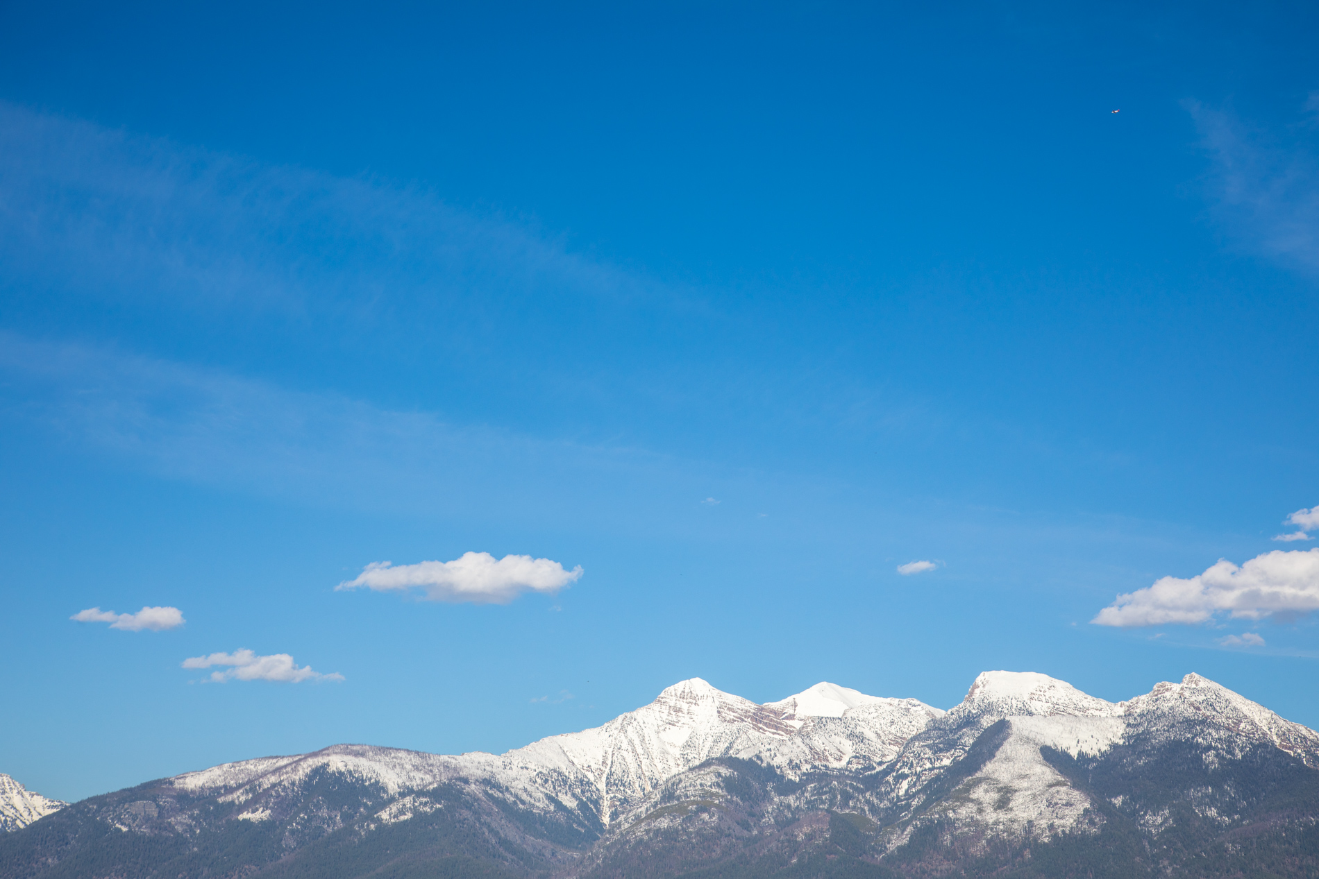 blue sky with snow mountains